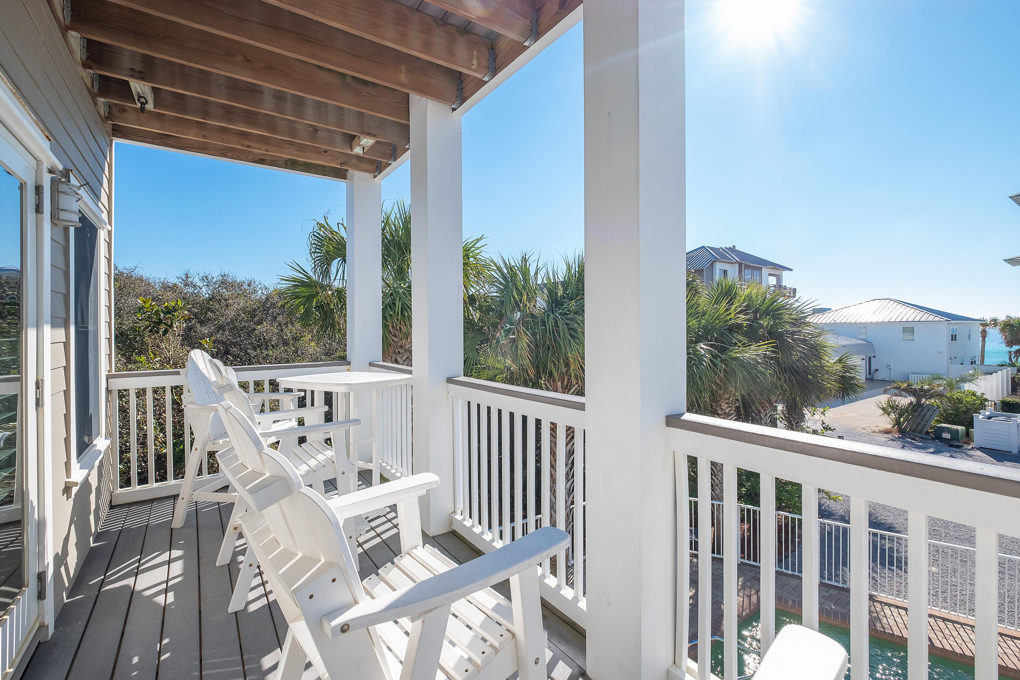 8968 East County Highway 30A Inlet Beach, FL 32461 - Photo 42 of 46 a view of a chair and table on the deck