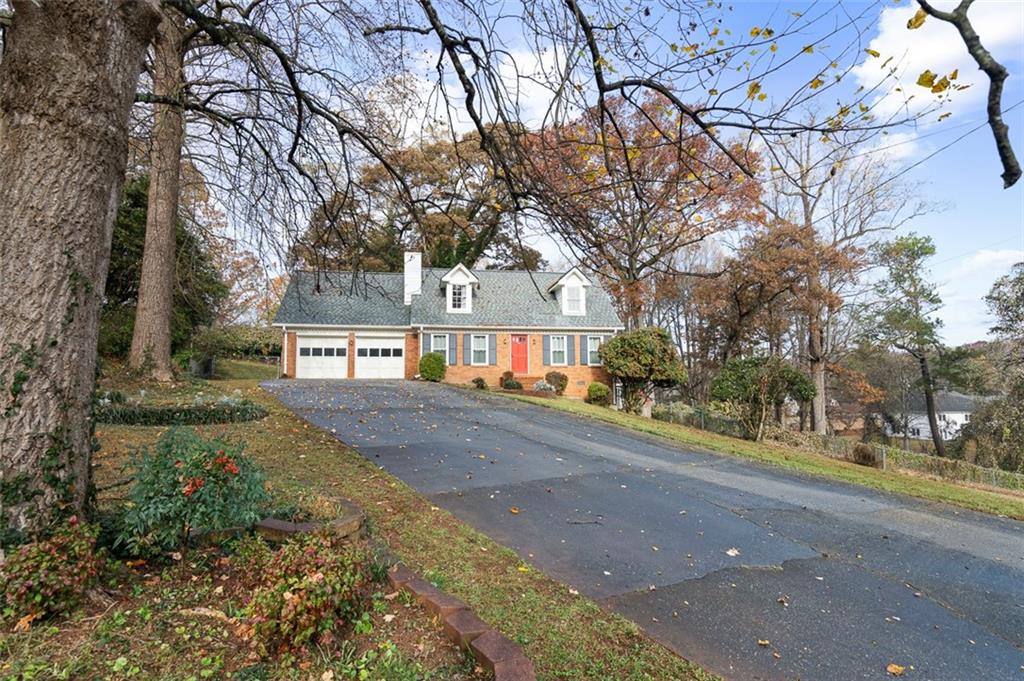 474 Daisy Trail Lawrenceville, GA 30046 - Photo 2 of 41 a view of a street with houses on both side
