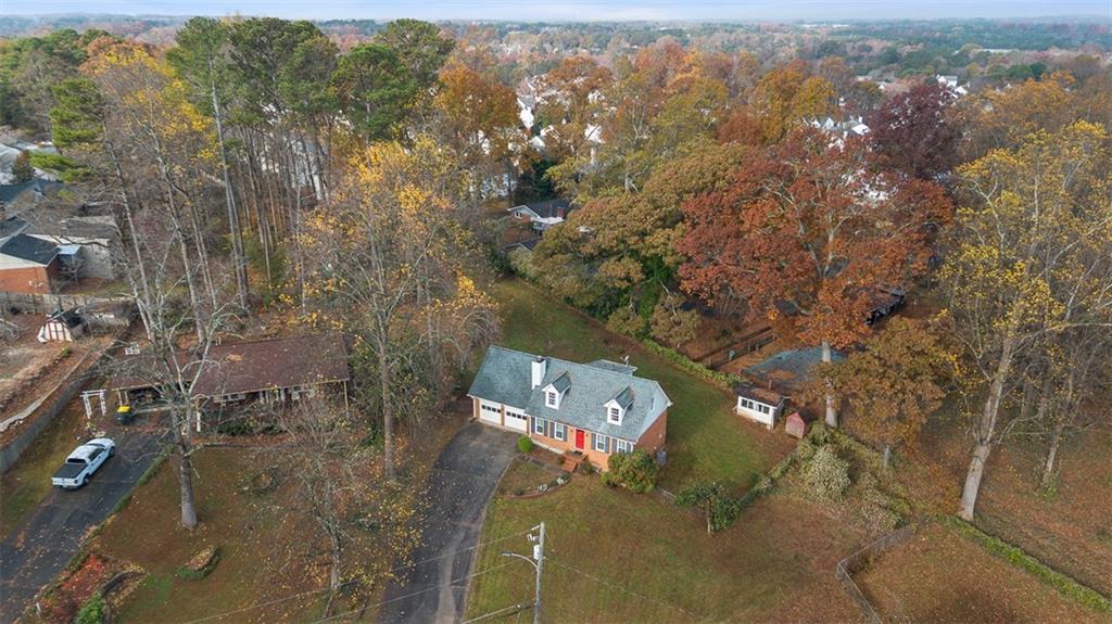 474 Daisy Trail Lawrenceville, GA 30046 - Photo 4 of 41 an aerial view of a house with a yard