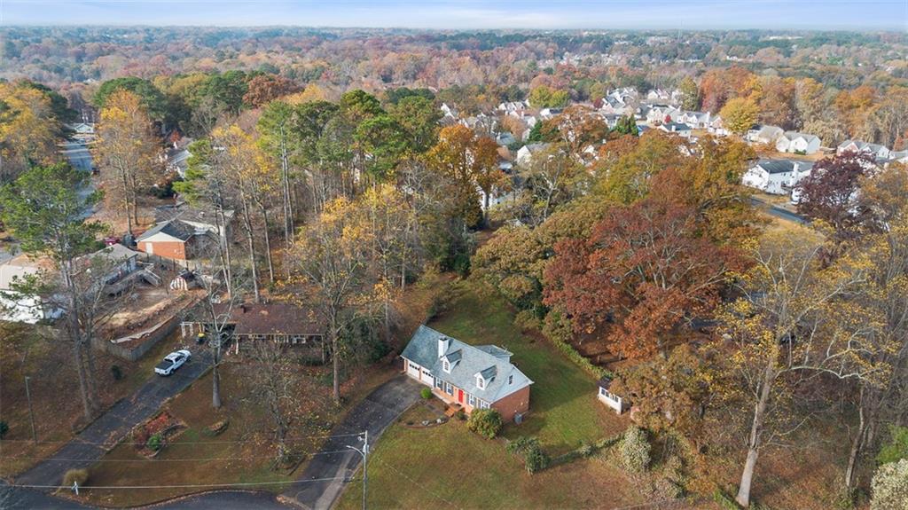 474 Daisy Trail Lawrenceville, GA 30046 - Photo 5 of 41 an aerial view of a house with a yard