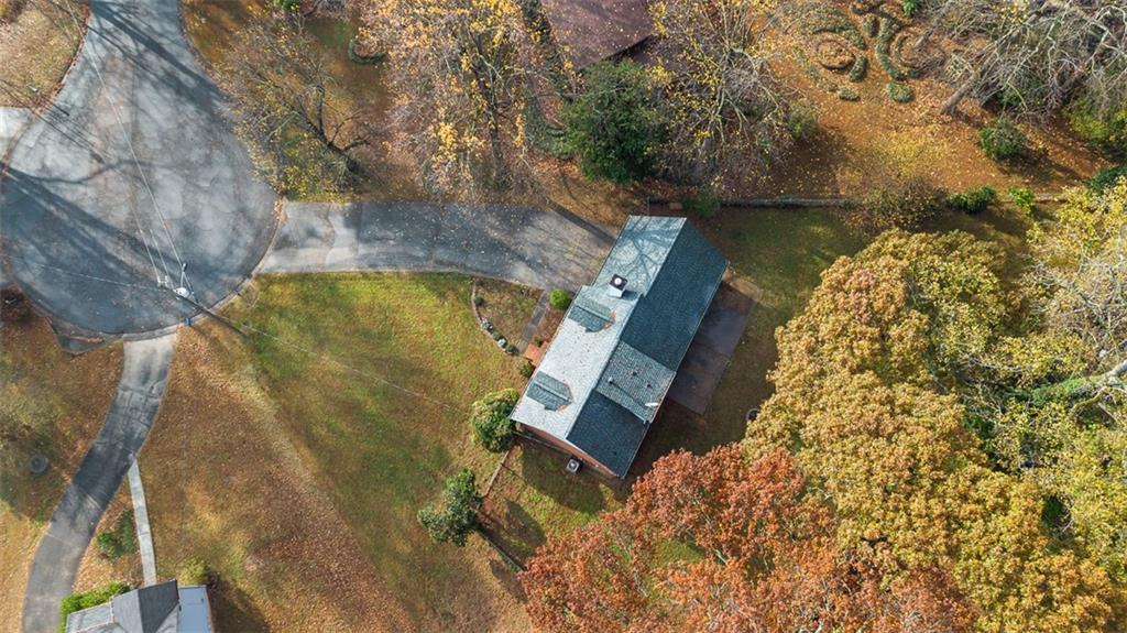 474 Daisy Trail Lawrenceville, GA 30046 - Photo 7 of 41 a aerial view of a house with a yard and large trees