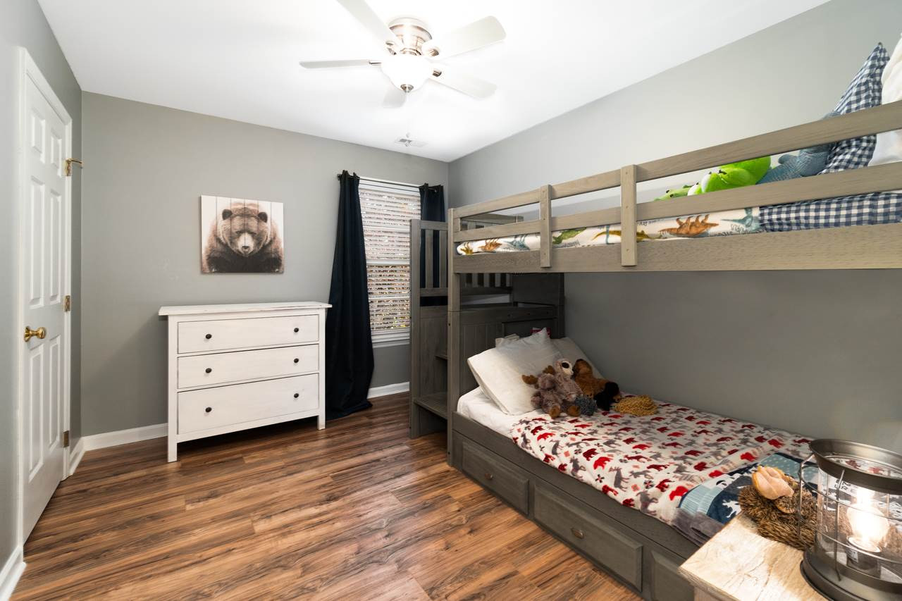 8727 Harps Mill Road Raleigh, NC 27615 - Photo 17 of 25 Bedroom 2 - Easy maintenance & gorgeous laminate flooring continues througout the 2nd floor! Bedroom