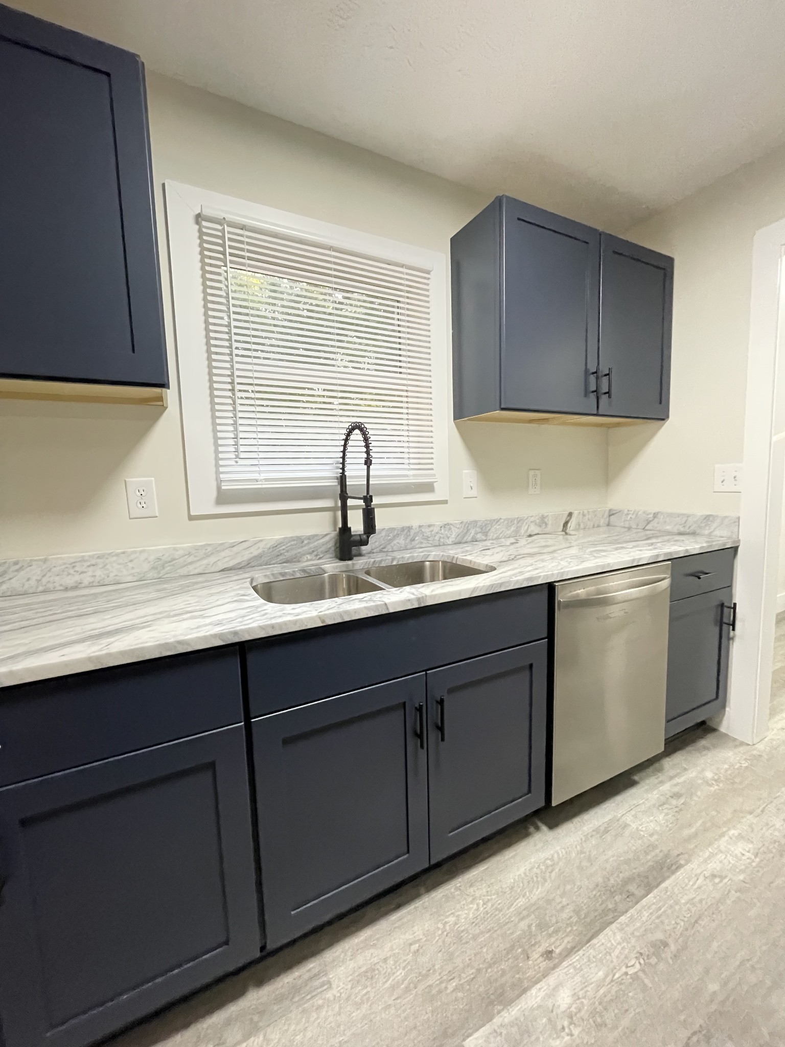 7754 Fernvale Road Fairview, TN 37062 - Photo 11 of 60 a kitchen with a sink cabinets and window