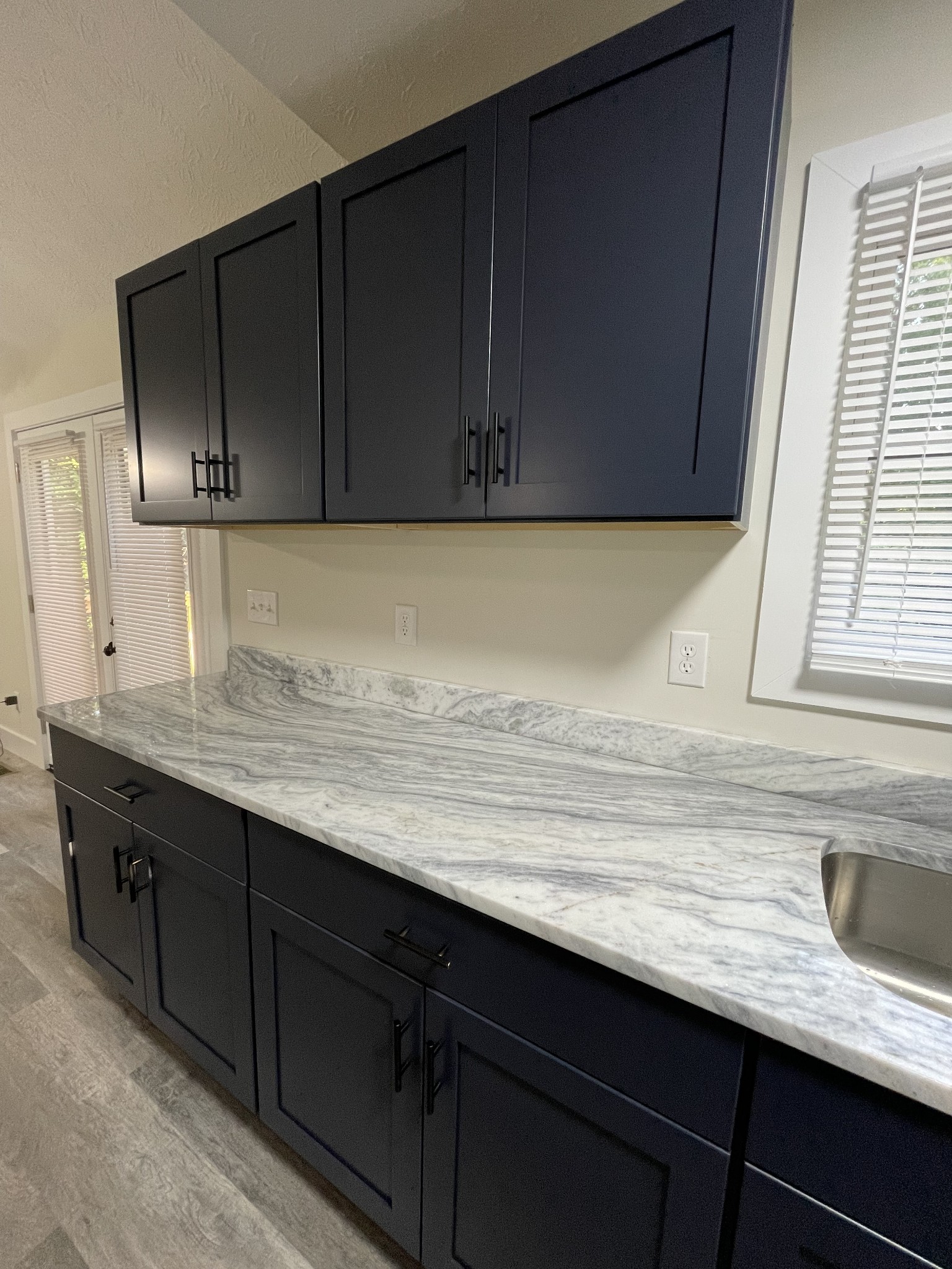 7754 Fernvale Road Fairview, TN 37062 - Photo 15 of 60 a kitchen with a sink and cabinets