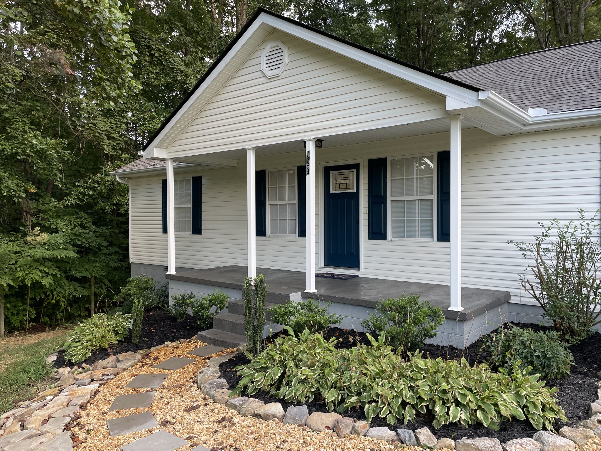 7754 Fernvale Road Fairview, TN 37062 - Photo 3 of 60 a front view of a house with a yard