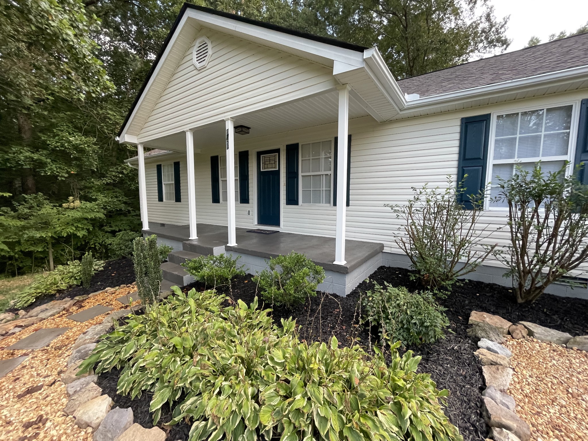 7754 Fernvale Road Fairview, TN 37062 - Photo 38 of 60 a view of a house with a yard and garden