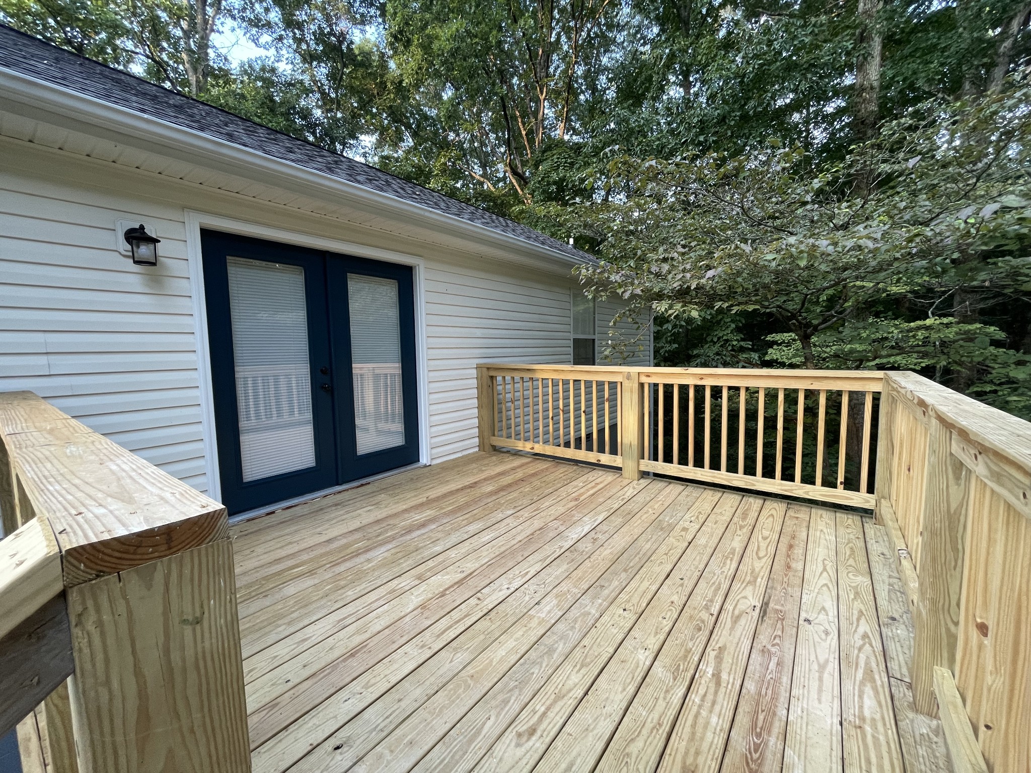 7754 Fernvale Road Fairview, TN 37062 - Photo 56 of 60 a view of backyard with deck and wooden floor