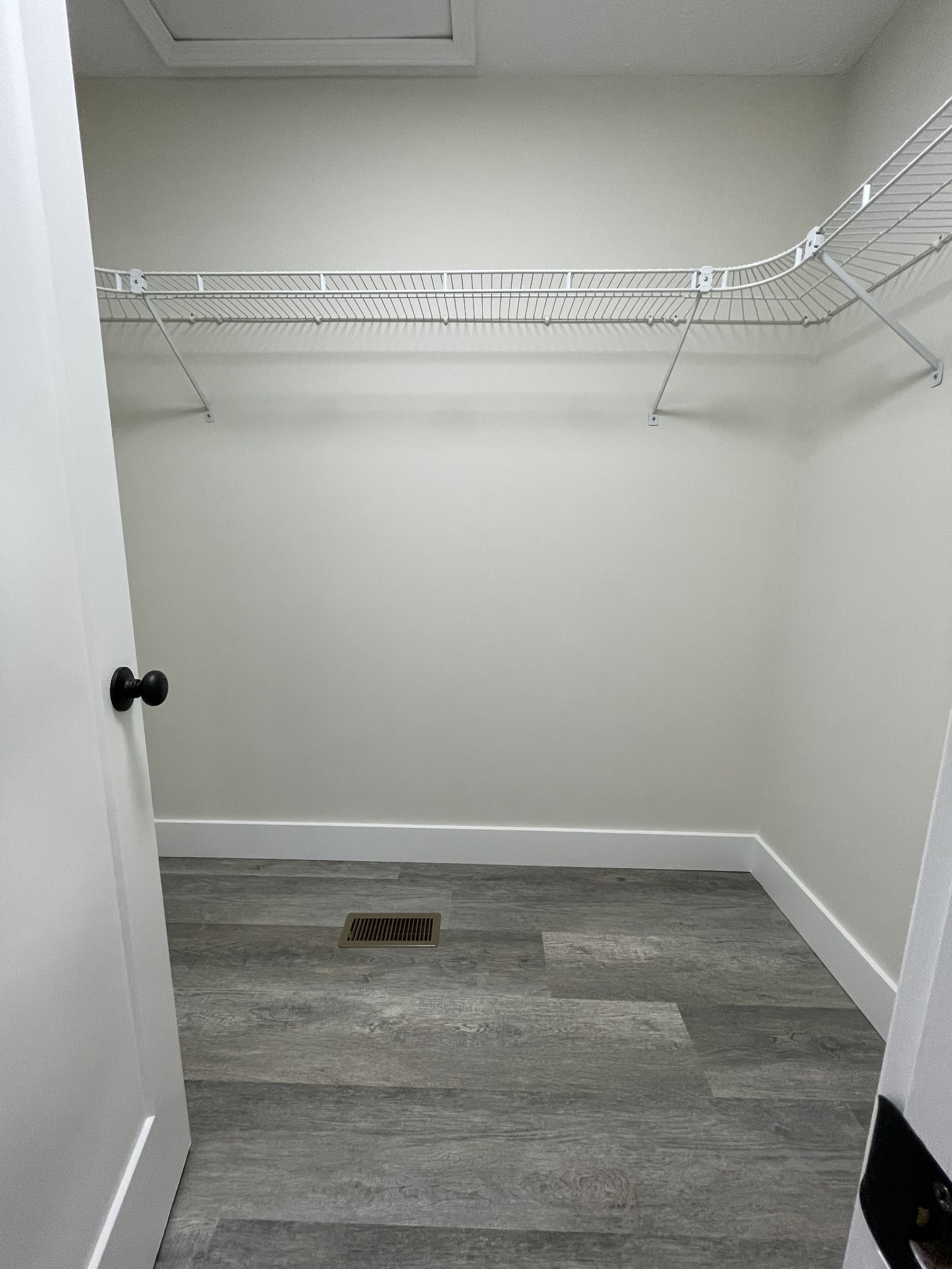 7754 Fernvale Road Fairview, TN 37062 - Photo 7 of 60 a view of a room with racks on the wall