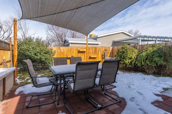 a backyard of a house with seating space