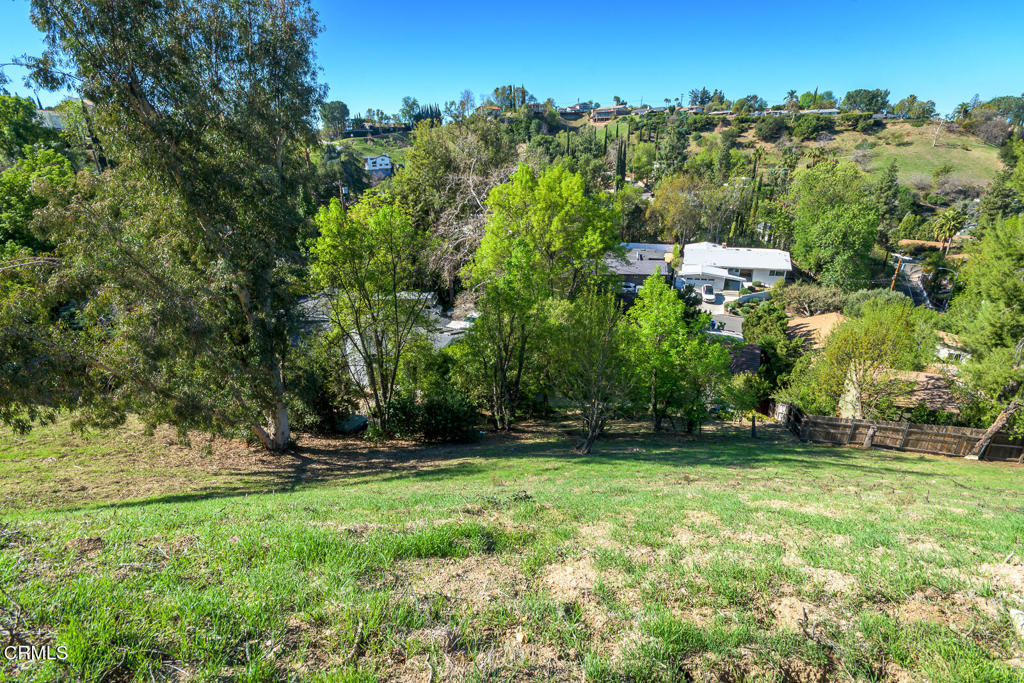 4845 Calderon Road Woodland Hills, CA 91364 - Photo 21 of 54 a view of outdoor space with deck and yard