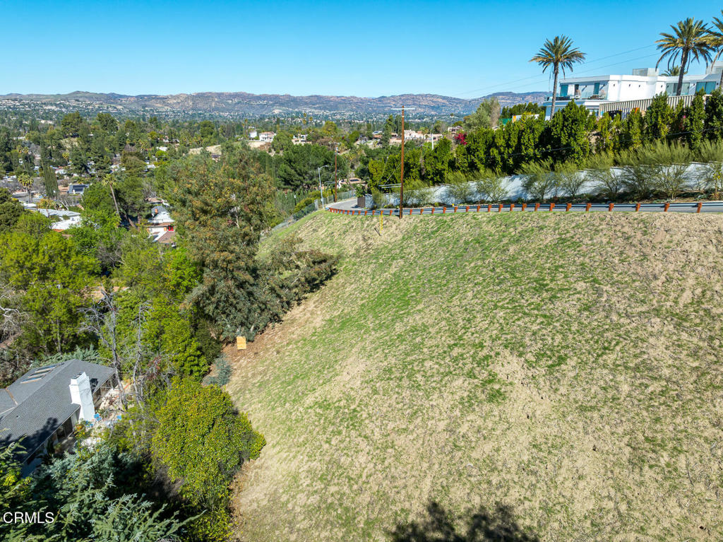4845 Calderon Road Woodland Hills, CA 91364 - Photo 26 of 54 an aerial view of residential houses with outdoor space and trees