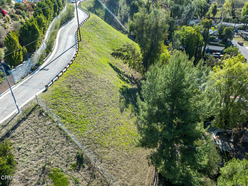 4845 Calderon Road Woodland Hills, CA 91364 - Photo 38 of 54 an aerial view of residential houses with outdoor space