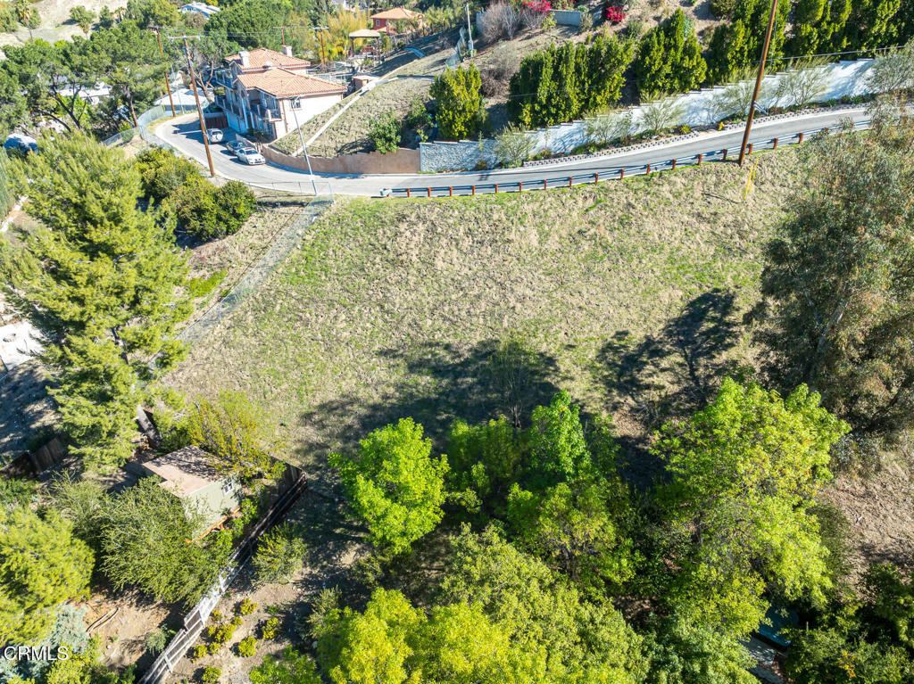 4845 Calderon Road Woodland Hills, CA 91364 - Photo 41 of 54 a view of a back yard of the house
