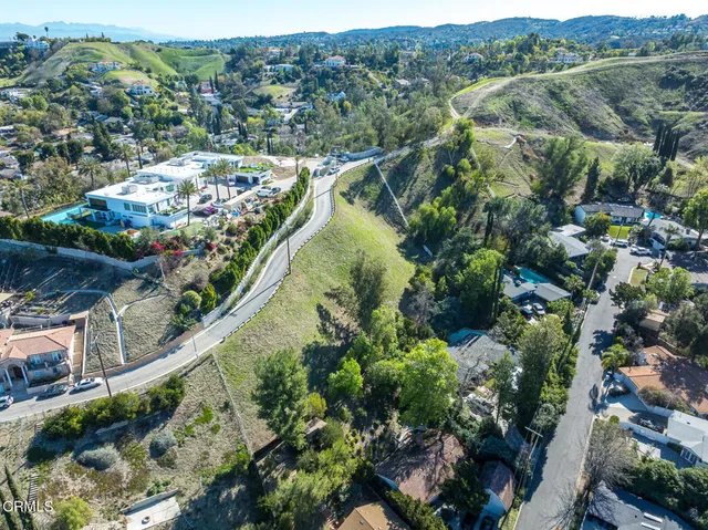 a view of a garden with a pathway