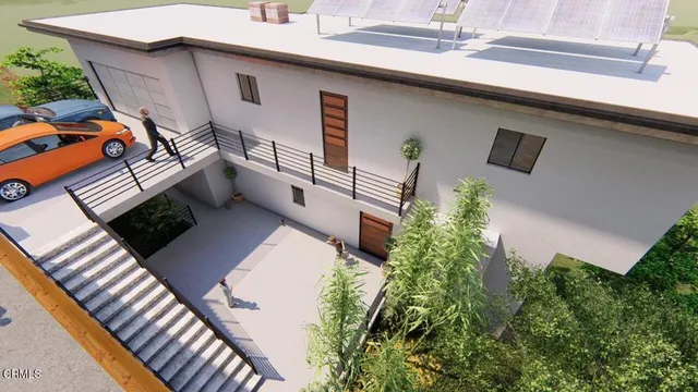 a view of backyard with patio