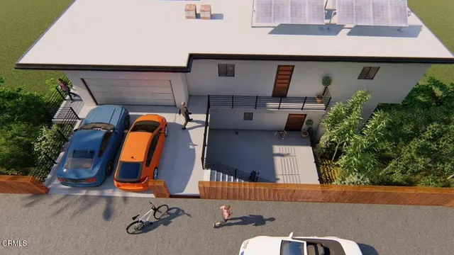 an aerial view of house with yard