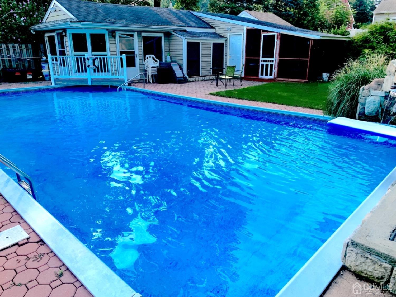 191 Oxford Road Colonia, NJ 07067 - Photo 10 of 23 a view of a house with pool yard and porch