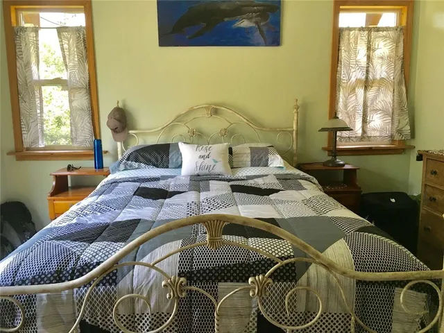 a living room with furniture and window