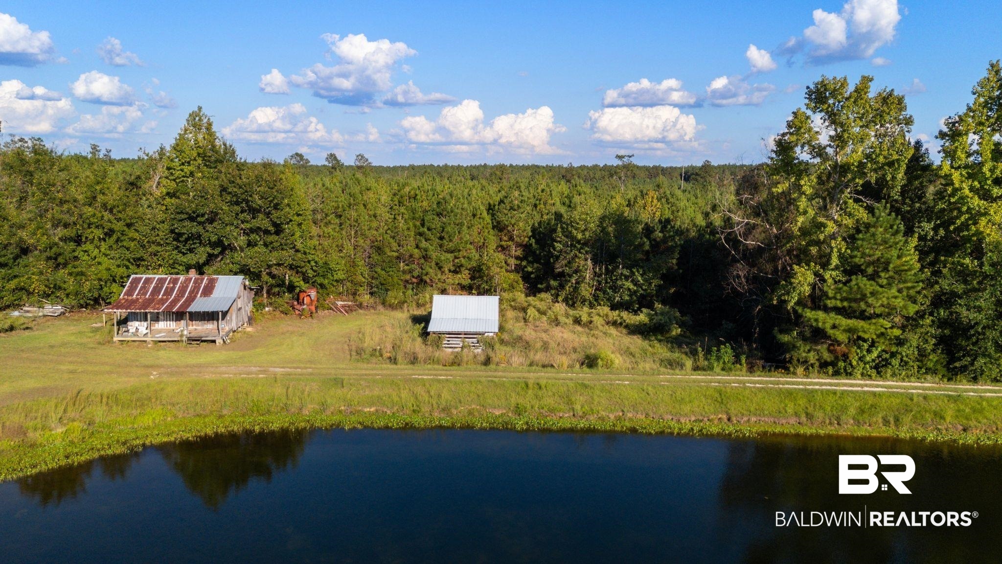 888 Mobile Cut-Off Road St. Stephens, AL 36569 - Photo 51 of 54 View of subject property with a nearby body of water