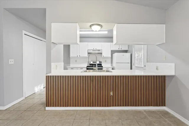 a view of kitchen with sink