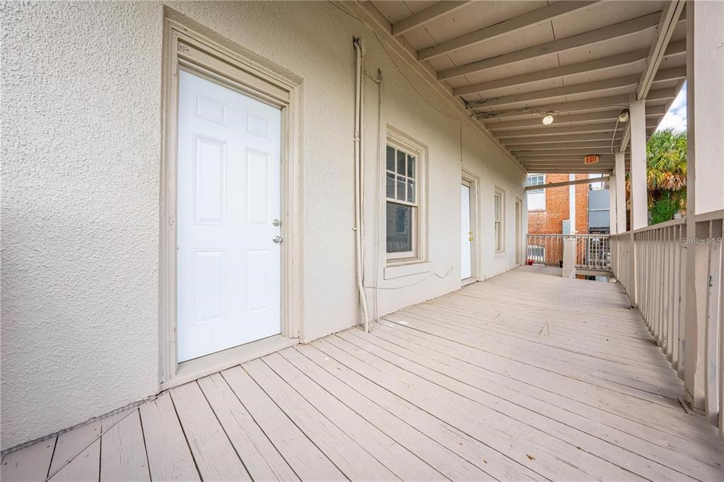35 North 6th Street, Unit 8 Haines City, FL 33844 - Photo 15 of 17 a view of a house with wooden floor