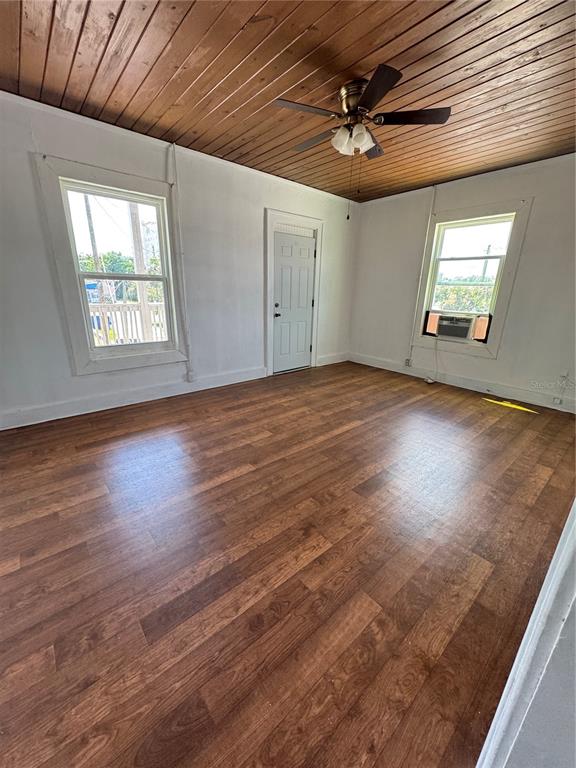 35 North 6th Street, Unit 8 Haines City, FL 33844 - Photo 5 of 17 en empty room with windows and ceiling fan
