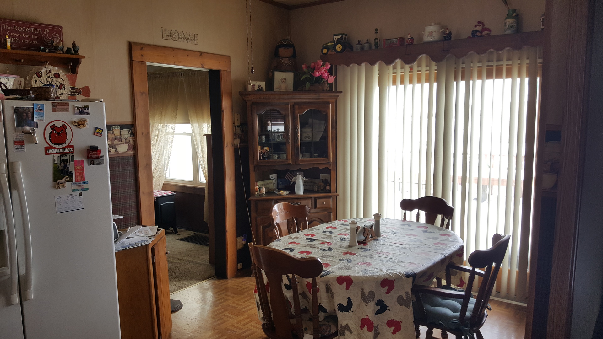 2256 North 14th Road Streator, IL 61364 - Photo 3 of 18 a view of a dining room with furniture and window