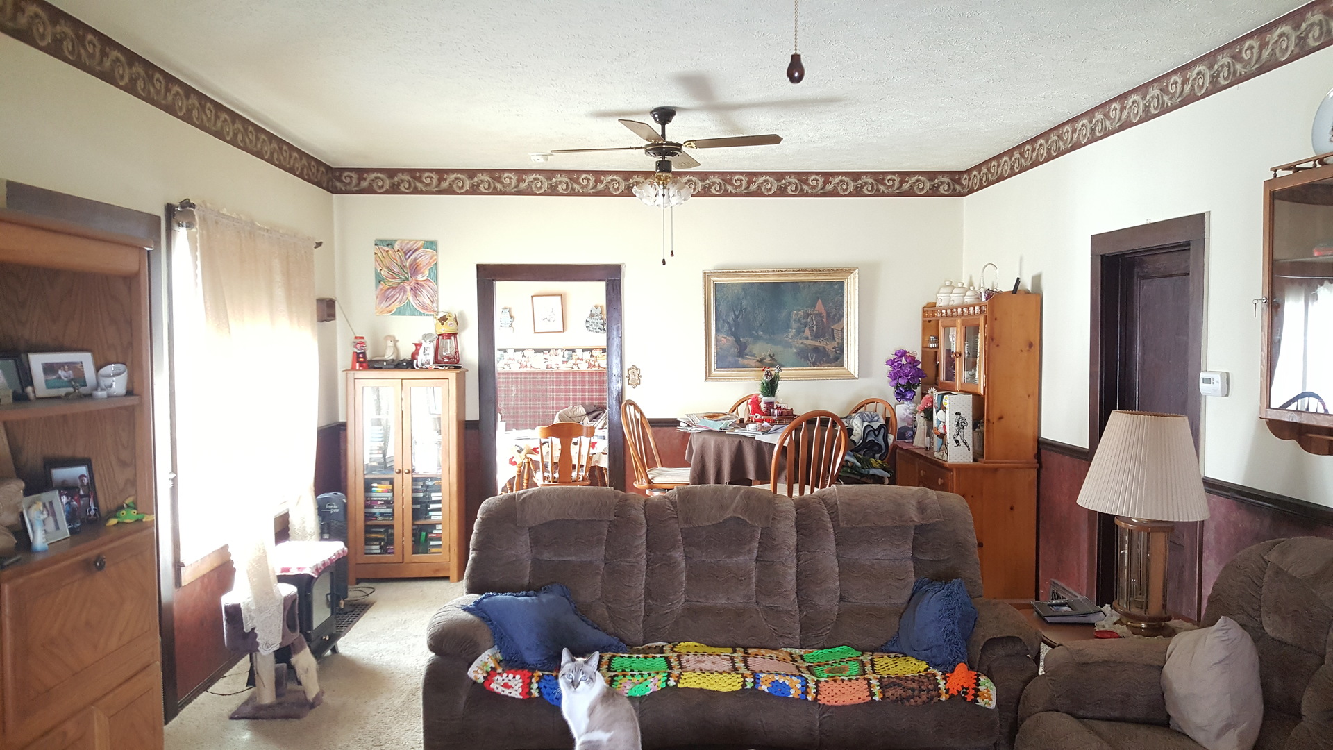 2256 North 14th Road Streator, IL 61364 - Photo 5 of 18 a living room with furniture and a chandelier