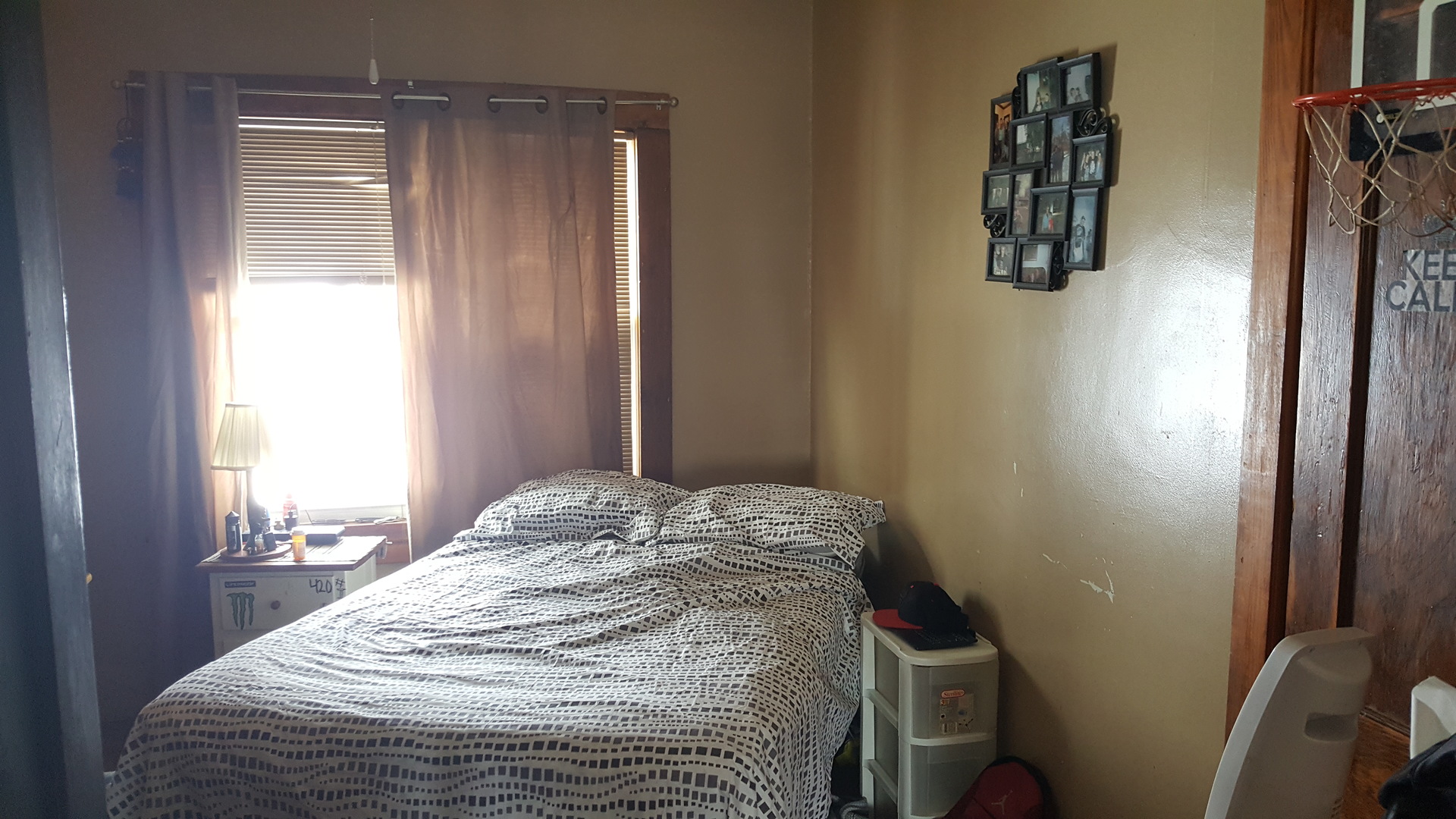 2256 North 14th Road Streator, IL 61364 - Photo 8 of 18 a bedroom with a bed and painting on the wall