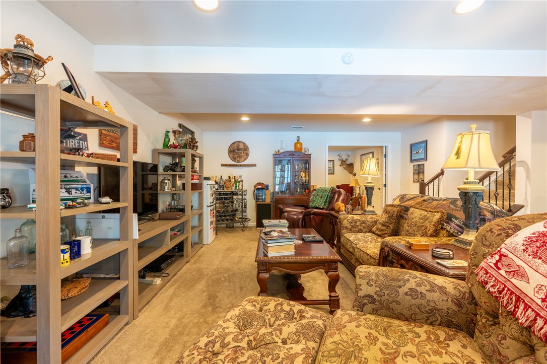 109 Smith Farm Way Easley, SC 29642 - Photo 24 of 37 This inviting family room offers a comfortable and versatile living space for relaxation and entertainment.