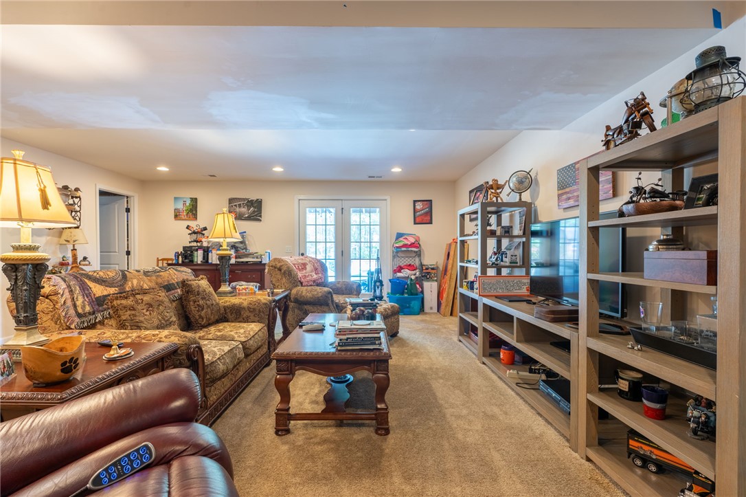 109 Smith Farm Way Easley, SC 29642 - Photo 29 of 37 This spacious living area features recessed lighting and inviting double French doors leading to the outdoors.