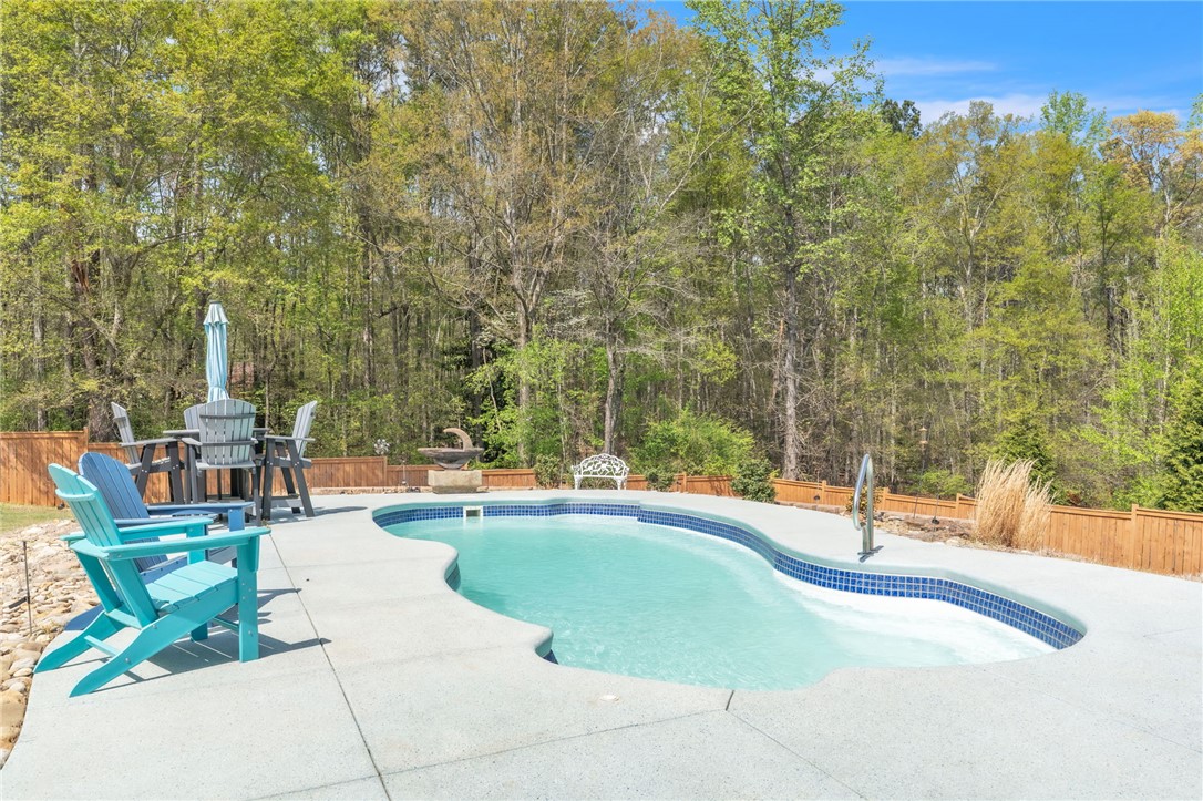 109 Smith Farm Way Easley, SC 29642 - Photo 31 of 37 Relax and unwind in this inviting outdoor oasis featuring a sparkling pool.