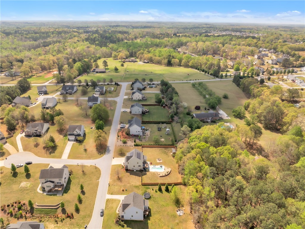 109 Smith Farm Way Easley, SC 29642 - Photo 35 of 37 An aerial perspective reveals a serene residential community nestled amidst verdant landscapes, offering a tranquil retreat.