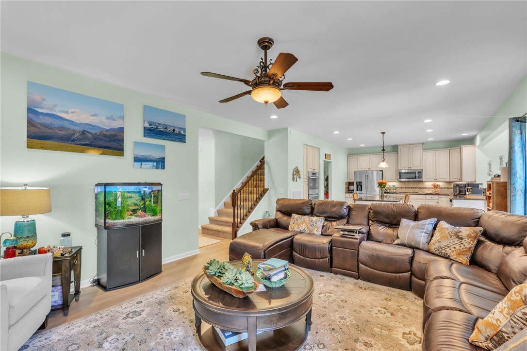 109 Smith Farm Way Easley, SC 29642 - Photo 7 of 37 An inviting open-concept living space features a functional layout and ample natural light.