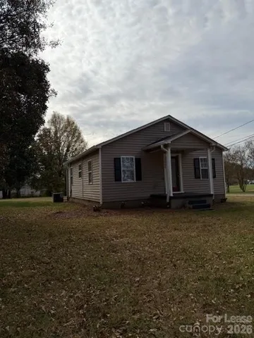 a house view with a garden space