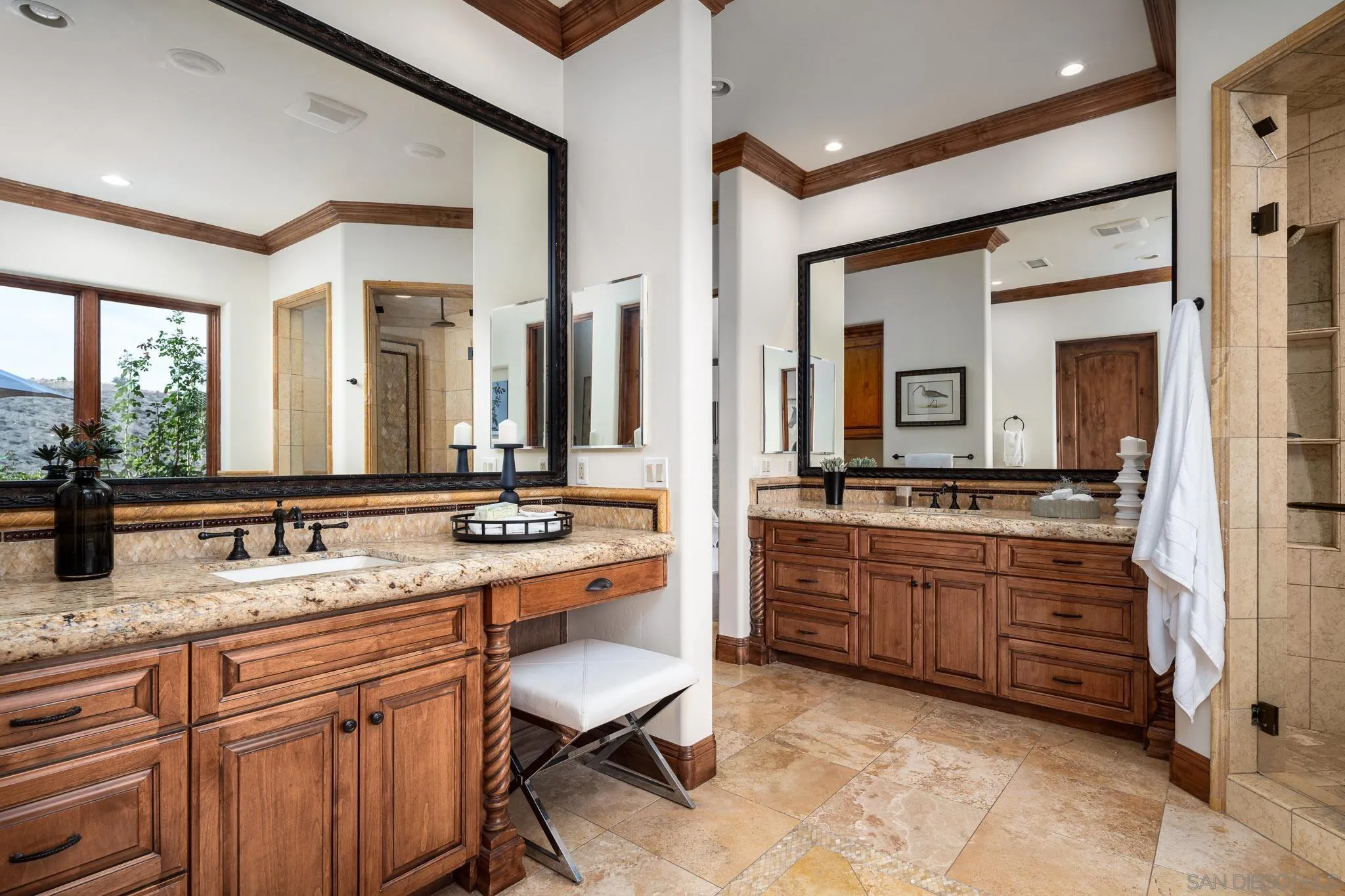 16531 Zumaque Street Rancho Santa Fe, CA 92067 - Photo 25 of 48 a bathroom with a granite countertop sink and a mirror