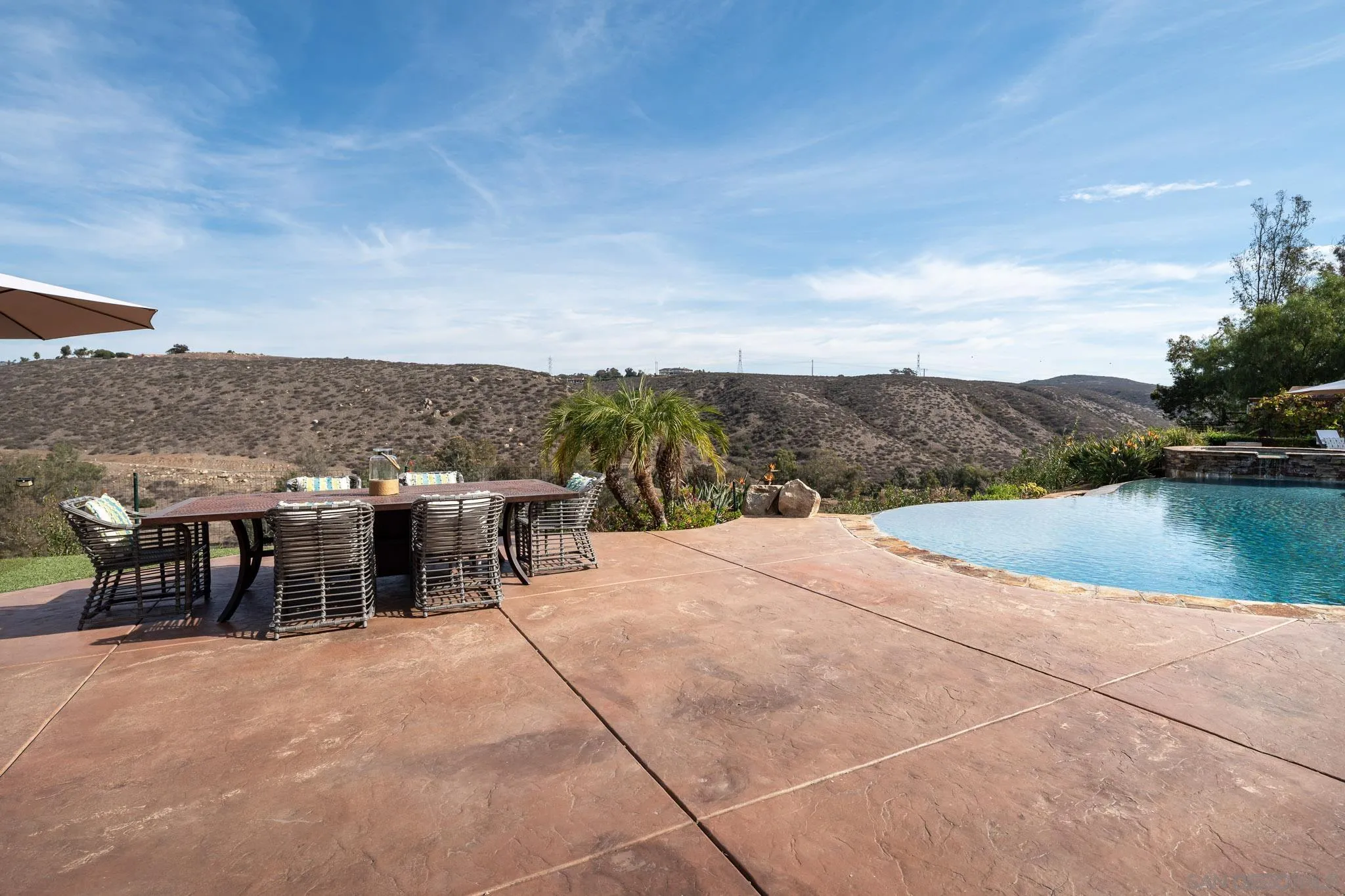 16531 Zumaque Street Rancho Santa Fe, CA 92067 - Photo 35 of 48 a view of a terrace with yard