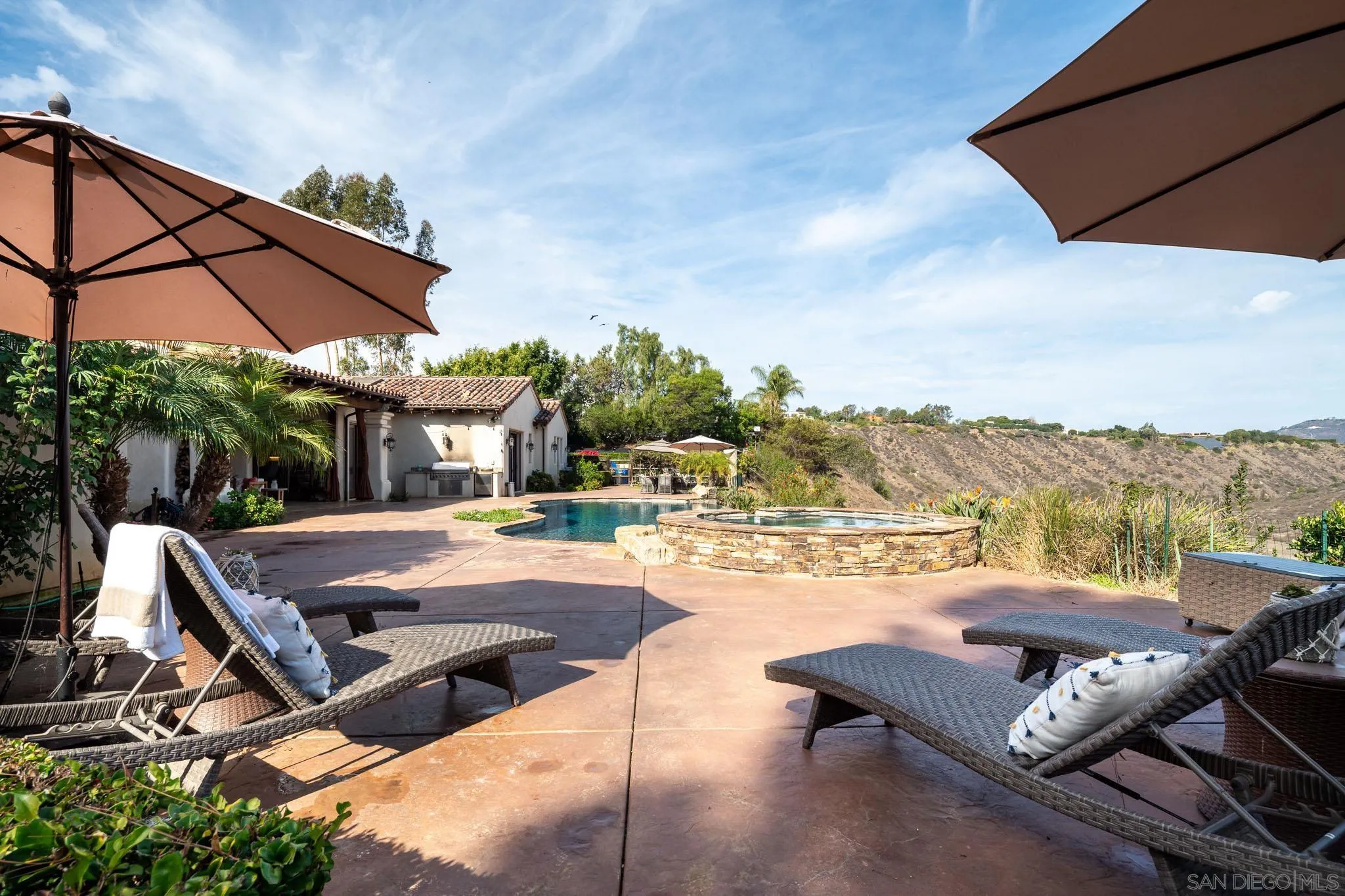 16531 Zumaque Street Rancho Santa Fe, CA 92067 - Photo 41 of 48 a view of swimming pool with lounge chairs