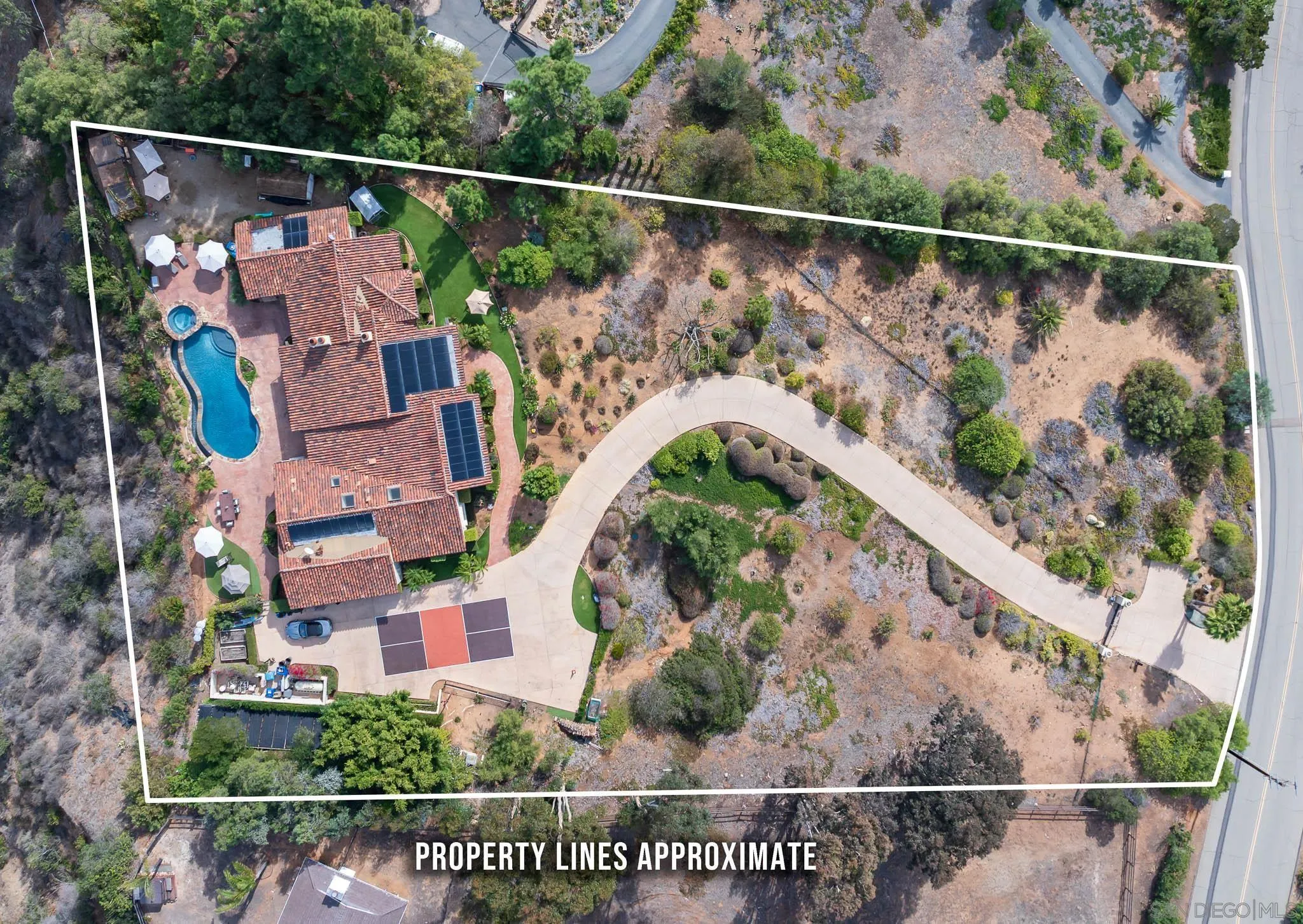 16531 Zumaque Street Rancho Santa Fe, CA 92067 - Photo 48 of 48 a view of house with a swimming pool