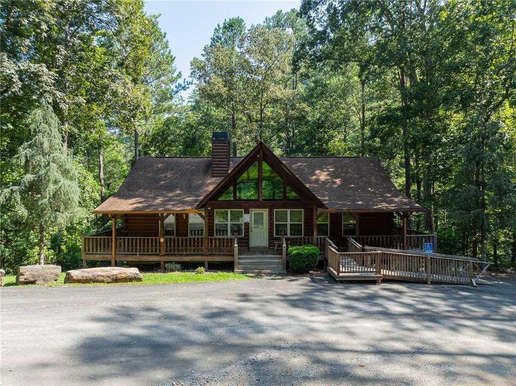 1171 Hunter Drive Ranger, GA 30734 - Photo 17 of 19 a front view of a house with a garden