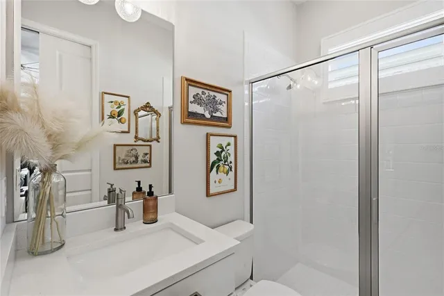 a kitchen with stainless steel appliances kitchen island granite countertop a sink and cabinets