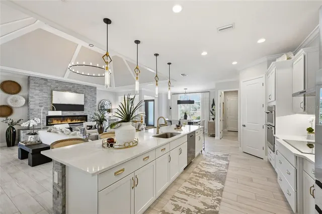 a bedroom with a bed and large window