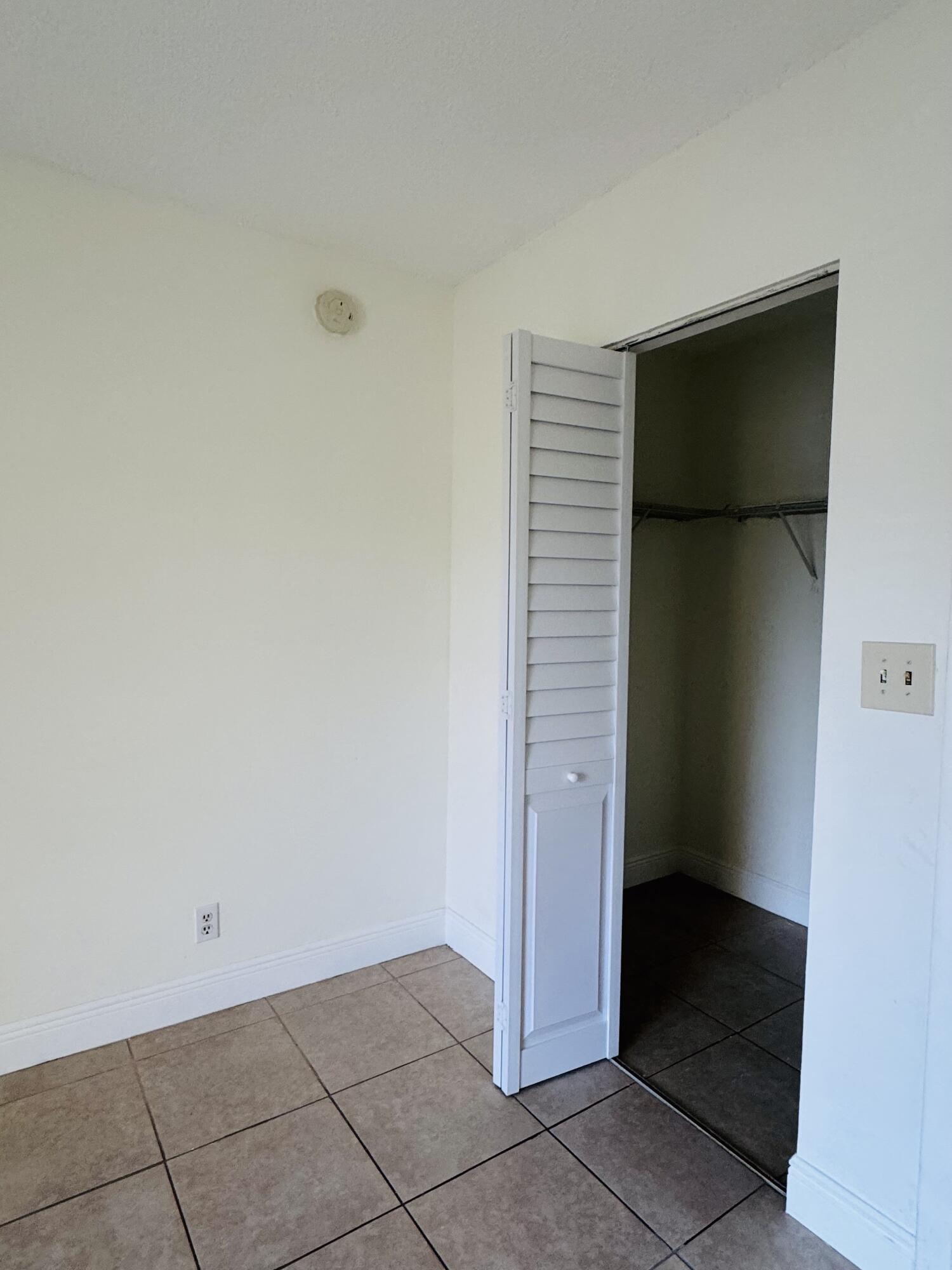 480 Northwest 20th Street, Unit 3020 Boca Raton, FL 33431 - Photo 6 of 16 Bedroom Closet