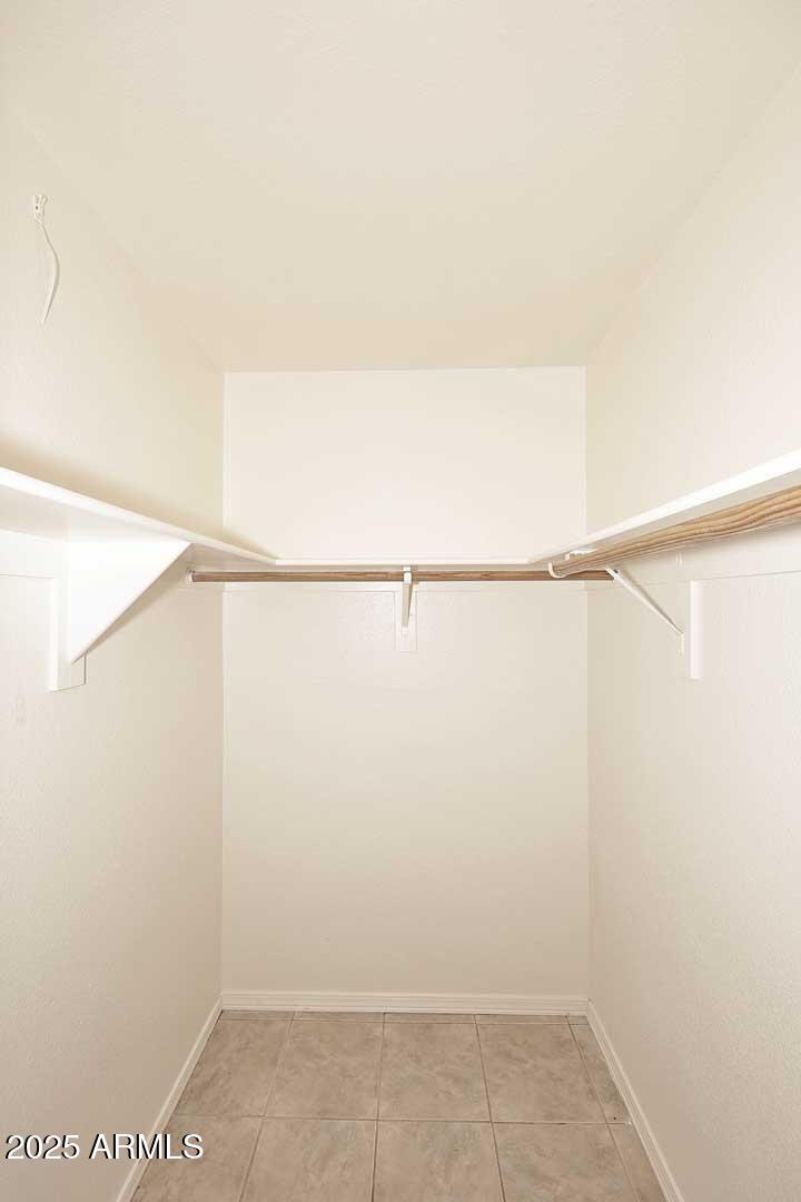 303 North Miller Road, Unit 1007 Scottsdale, AZ 85257 - Photo 21 of 28 a view of small space with racks on the wall