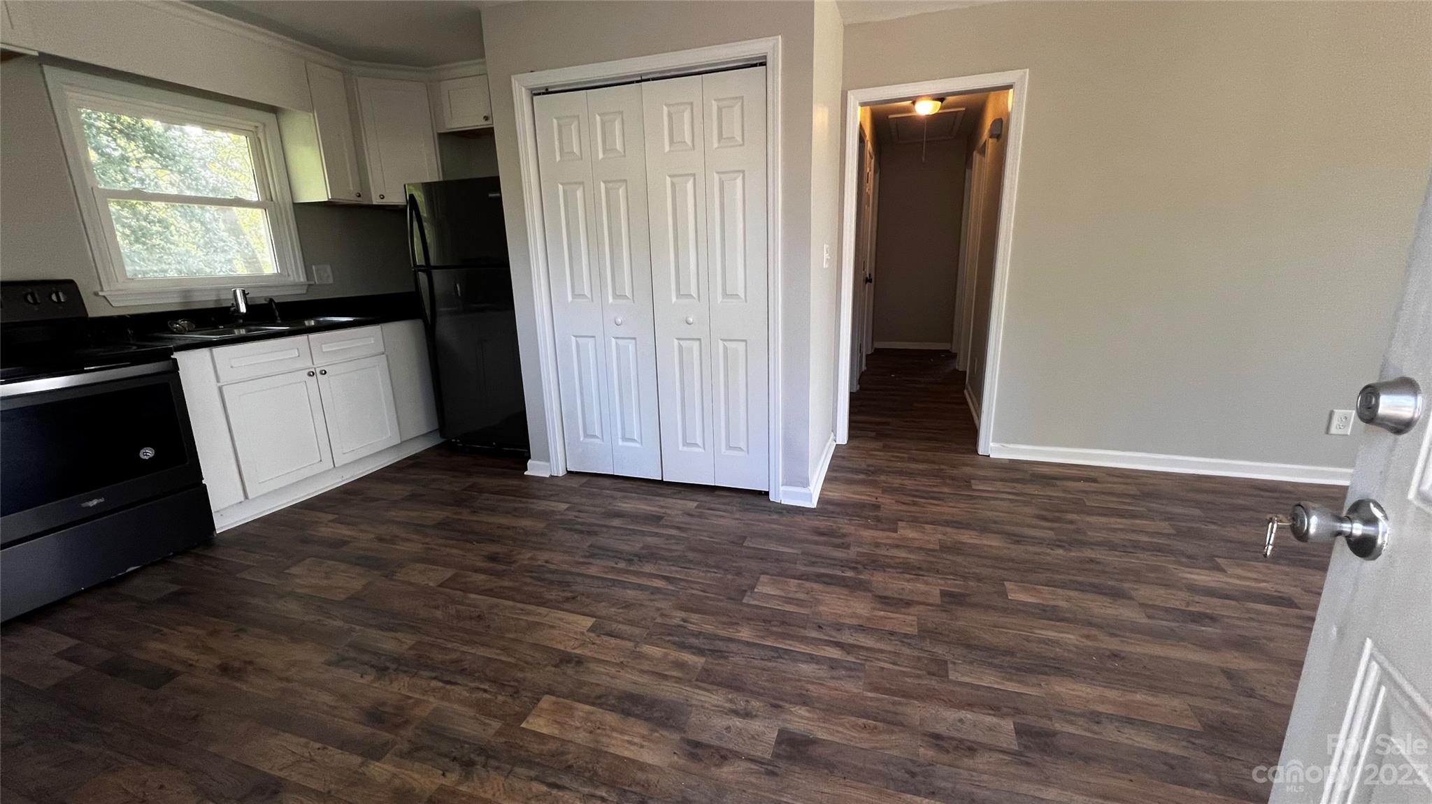 1919 Petty Road Shelby, NC 28150 - Photo 4 of 12 a view of a kitchen with wooden floor and cabinets