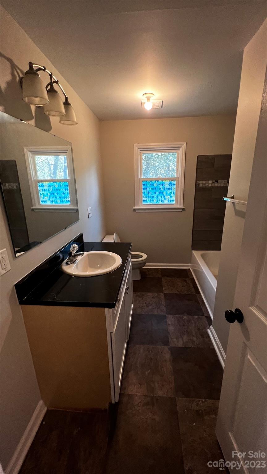 1919 Petty Road Shelby, NC 28150 - Photo 10 of 12 a view of a hallway with workspace and a window