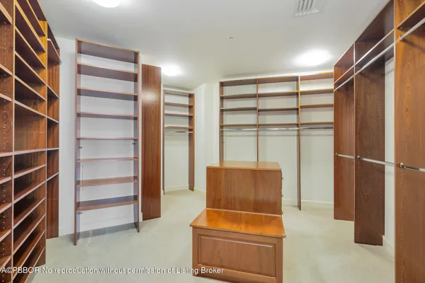 a room with furniture and a closet