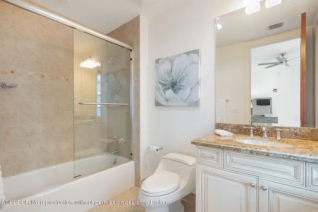 a bathroom with a sink a toilet and a bathtub