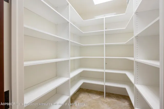 a view of an empty walk in closet