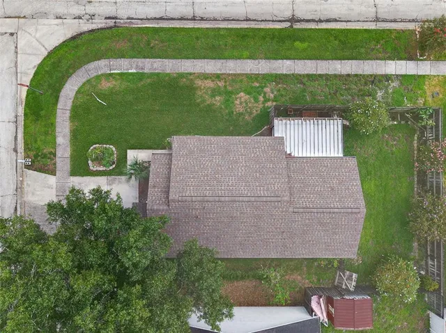 a brick building with a yard